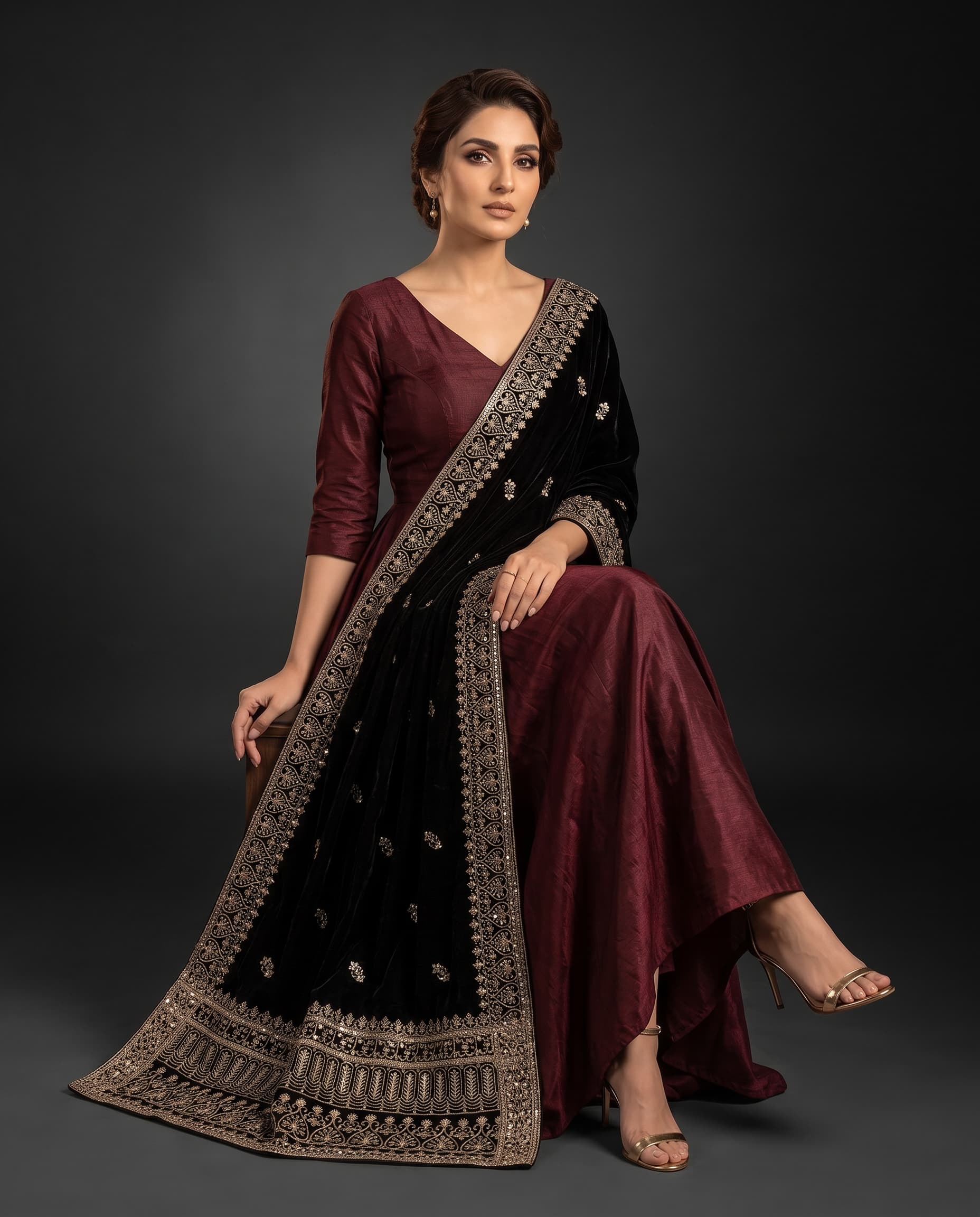 Black & Gold Floral Buti Phoenix Velvet Shawl - seated styling showing the layered pallu border